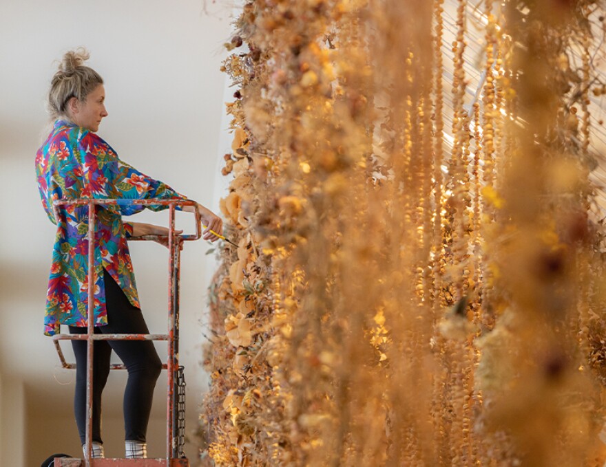 Rebecca Louise Law working on "Awakening" at the Honolulu Museum of Art