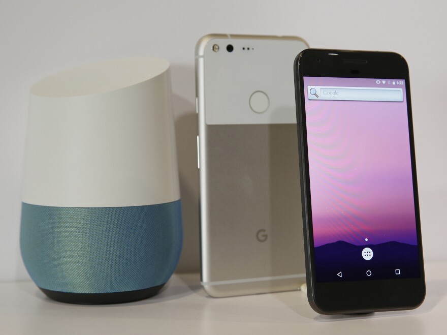 The Google Home speaker and the Google Pixel phone. (AP Photo/Eric Risberg)