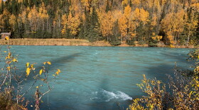 Autumn foliage frames the Kasilof River on Saturday, Oct. 3, 2020 in Kasilof, Alaska.