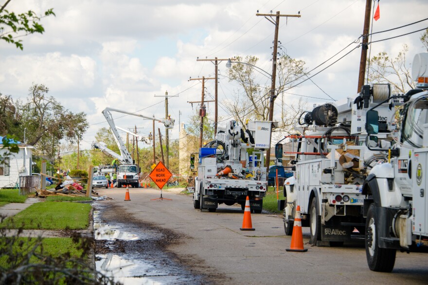 Entergy crews work to restore power to a neighborhood in Goosport, Louisiana north of Lake Charles after Hurricane Laura, a Category 4 storm, swept through the area in August 2020. 