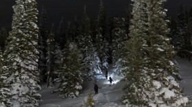 A group prepares to participate in a hike/ ski event to commemorate a World War II battle at the top of the Teton Pass February 18, 2024. The original ascent of the 86th Mountain Infantry’s 1st Battalion ascended Riva Ridge, took place on February 18, 1945. The soldiers trained with 90 packs, so the participants carried almost equally heavy packs.  The event was organized by Christian Beckwith, and took place in three locations: Mt. Glory, Jackson Hole; Whiteface Mountain, New York; Ski Cooper, Colorado. Photo by Natalie Behring