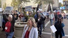 Rallyers marched through downtown Eugene chanting, "no contract, no peace" and "Eugene is a union town".