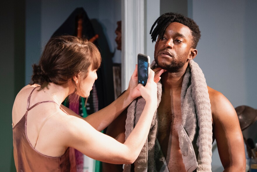 Katie Kleiger (as "Dawn") and RJ Brown (as "Leo") in "White Noise" at Studio Theatre (photo © Margot Shulman)