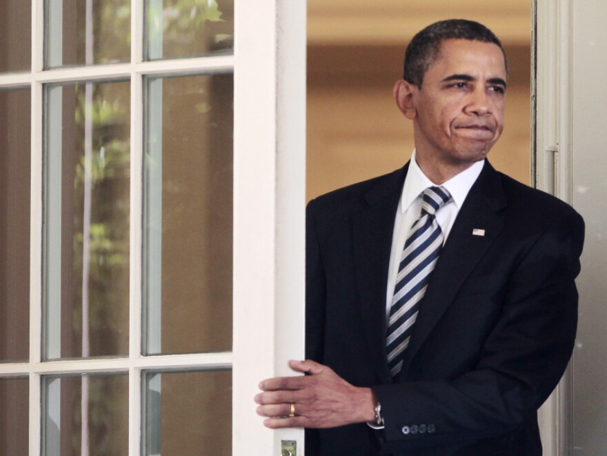President Barack Obama walks out to deliver a statement in the Rose Garden of the White House in Washington, Tuesday, Aug. 2, 2011, following the Senate's passing of the debt ceiling agreement. The president's approval rating fell during this most recent economic debate.