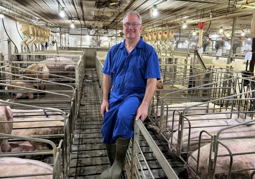 Dwight Mogler of Pig Hill Farms near Lester, Iowa, houses sows in individual stalls when they're ready to be bred, to keep them from showing aggression towards one another. But the stalls are too small under California's Proposition 12, meaning pork from Mogler's operation couldn't be sold in that state.