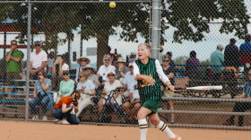 Barbara Jane Johnson, the oldest player on the Colorado Peaches at 92, hits a foul ball. Photo: Adrian O'Farrill, Rocky Mountain PBS.