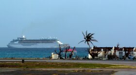 A cruise ship is seen leaving port days after this Caribbean island sustained extensive damage in the wake of Hurricane Irma, Friday, Sept. 15, 2017 in St. Martin. (Ricardo Arduengo/AFP/Getty Images)