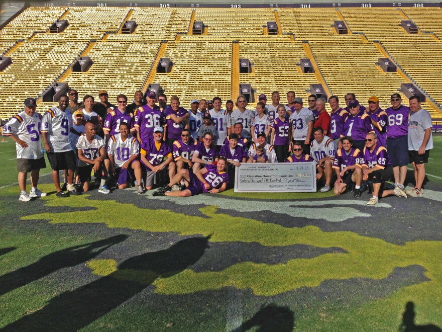Republicans and Democrats are all smiles after the Truce for the Troops Bowl in Tiger Stadium. 