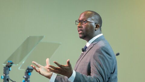 Warren Morgan speaks with his hands held open.