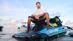 Pictured: David Pryce, 36, sits on a Yamaha personal watercraft in the waters off St. Croix during a Hooked on Life Fun Run on January 4.