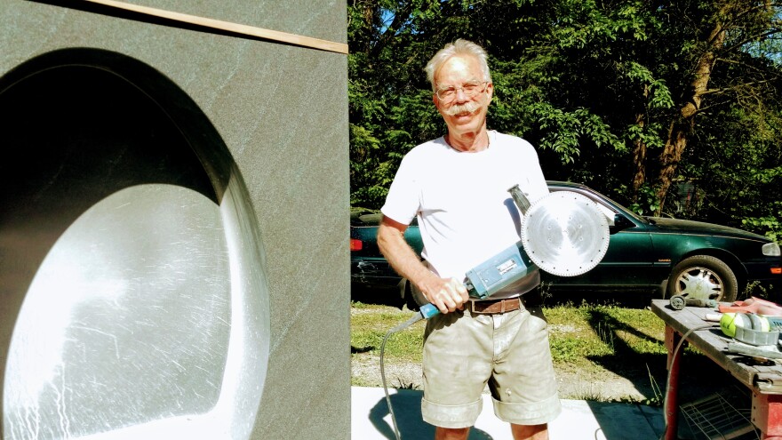 Sculptor Jon Barlow Hudson with a work-in-progress for the new Dayton Metro Library