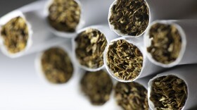 FILE - This Dec. 17, 2019 photo shows a group of cigarettes.