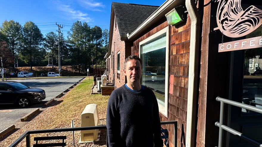 Todd Hubber owns Undercurrent Coffee in Plaza Midwood. A line of trees used to separate his business from the highway.
