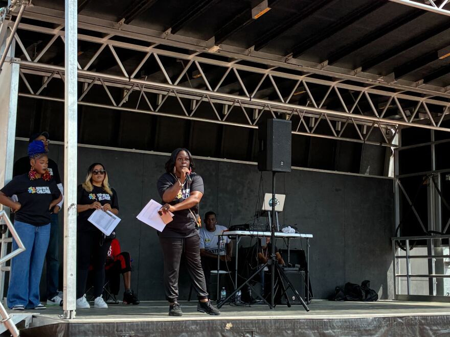 Shantae Graham calls for community to invest in youth during a rally in Winston-Salem.