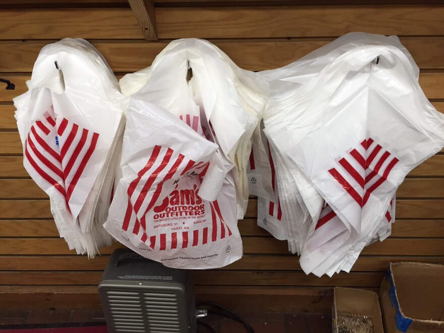 Plastic bags pictured at Sam's Outdoor Outfitters in Brattleboro, Vt., last year. Brattleboro's ban on single-use plastic bags went into effect July 1, and the Conservation Law Foundation hopes to get all six New England states to ban the bags as well.