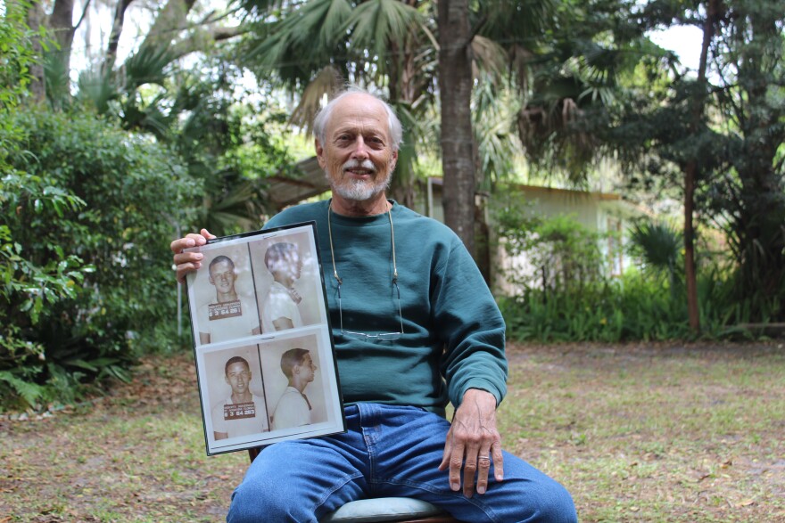 Dan Harmeling pictured with his mug shots from his arrest while protesting Black rights in St. Augustine during the 1960s. (Photo: PUT PHOTOGRAPHER IN HERE)