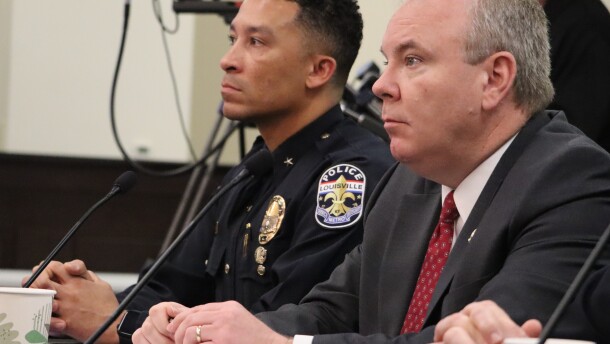 Rep. Jason Nemes, a Republican from Middletown, listens as votes are cast on House Bill 299 in committee Tuesday alongside Louisville Metro Police Chief Paul Humphrey.