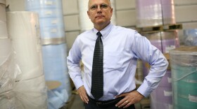 Prestige Ameritech Executive Vice President Mike Bowen, pictured in 2009, says his company can't keep up with demand for face masks used by doctors and nurses amid the coronavirus outbreak.