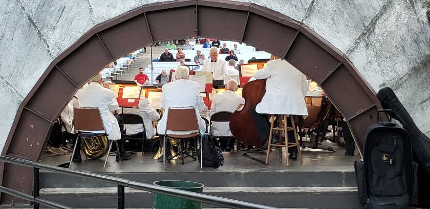 Kirk Lundbeck directs the DeKalb Municipal Band, as seen from behind the band shell.