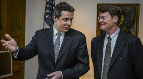 Former Gov. Andrew Cuomo, left, then New York attorney general, introduces Blair Horner, right, as new Policy and Public Integrity special advisor at a news conference in Albany, N.Y., Feb. 22, 2007. Horner, current executive director of New York Public Interest Research Group, said ethics officials should investigate Cuomo's reliance on former aides as he responded to sexual harassment allegations.