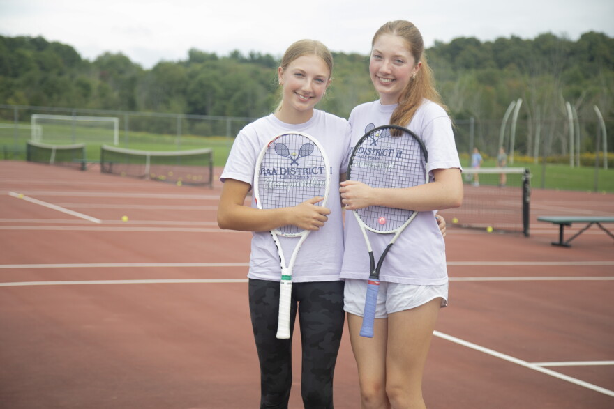 Anna and Cara Evans enjoy playing together during Cara's senior season at Montrose.