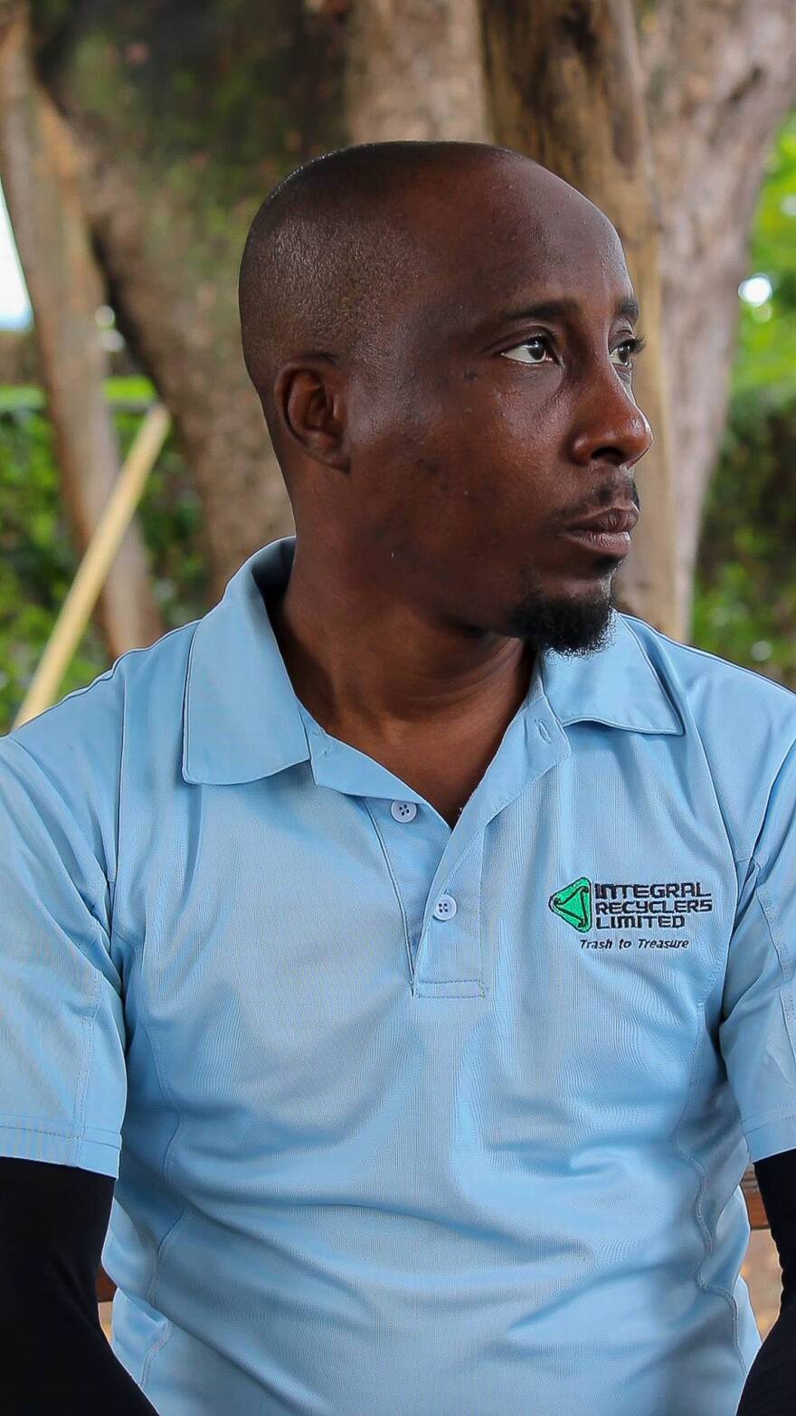 A man with a blue shirt.