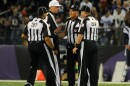 Things haven't been going well for these guys: Some of the NFL's replacement referees, during a Sept. 23 game between the New England Patriots and Baltimore Ravens.