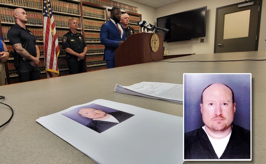 Jarrett Woodfork of the Onondaga County District Attorney's Office conducts a news conference with, at far left, Onondaga County Sheriff's Deputy Ryan Schruise and at right, Sheriff Toby Shelley concerning the arrest on child sex-related charges of Luke Underwood (mugshot in inset, provided by the District Attorney's office).