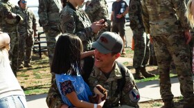 An airman reunites with his daughter.