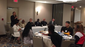 Cleveland Police Sgt. Charmin Leon (standing) says her department is working to recruit people more skilled in conflict resolution, a skill that's needed in the city since only about 7 percent of their calls end in an arrest.