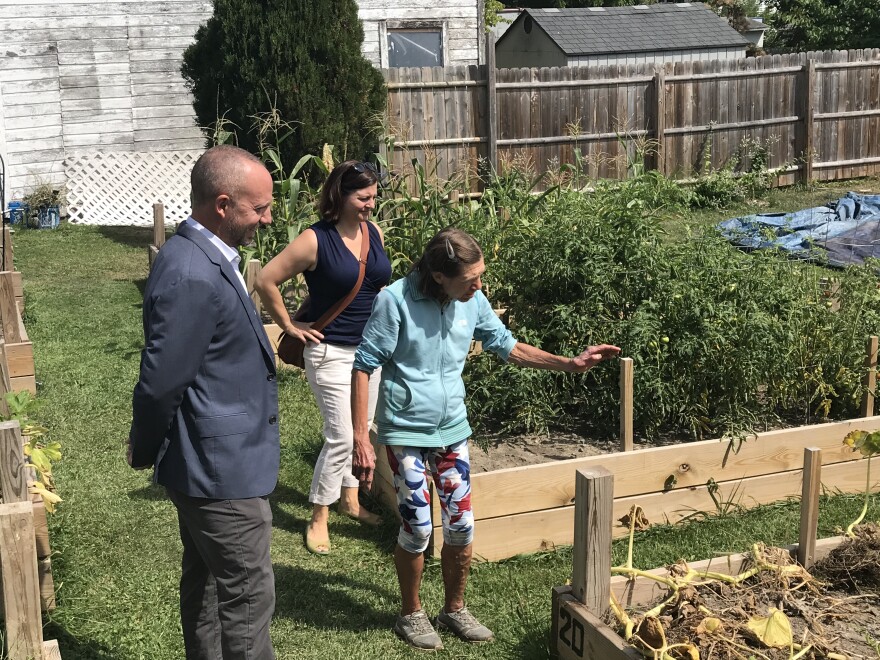 DEC Commissioner Basil Seggos tours a VINES garden in Endicott. (Vaughn Golden/WSKG)