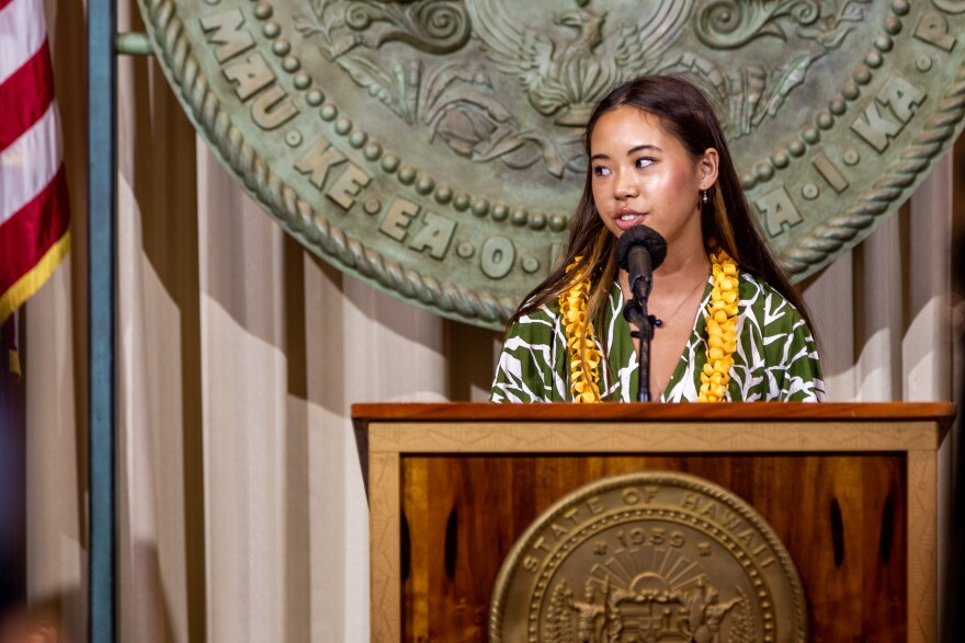 Kalāheo High School freshman Maya Butts speaks at a bill signing ceremony for Senate Bill 2175, which bans the sale of disposable e-cigarettes. (July 7, 2026)