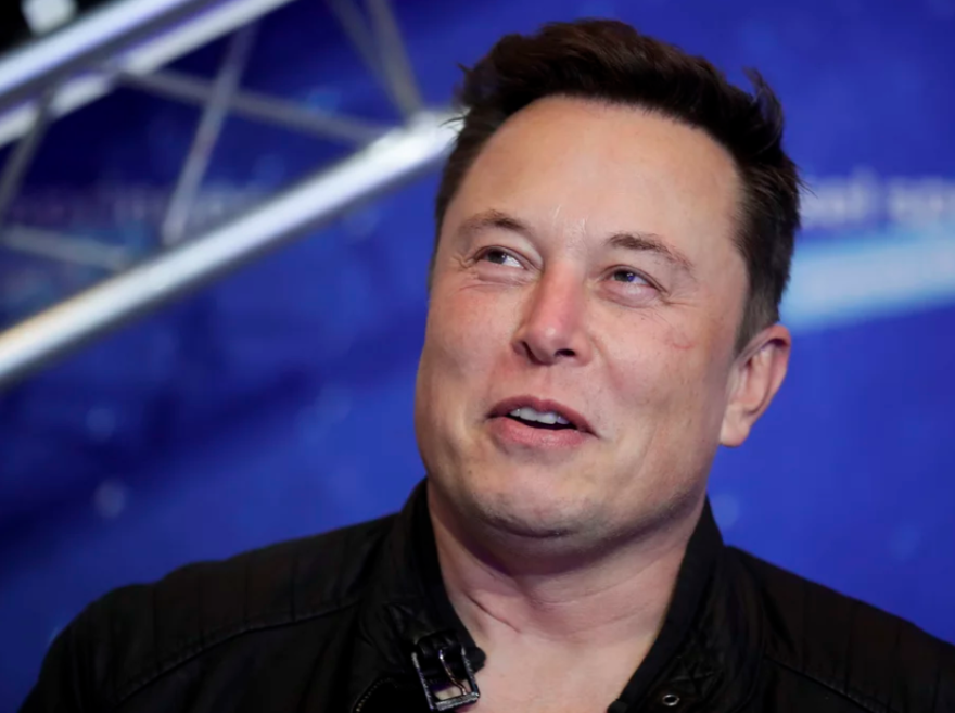 Tesla CEO Elon Musk arrives on the red carpet for the Axel Springer media award in Berlin in 2020. Activists are appealing to Tesla to close a new showroom in China's northwestern region of Xinjiang, where officials are accused of abuses against mostly Muslim ethnic minorities.Hannibal Hanschke/AP file photo