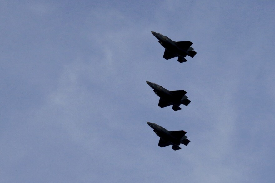 F-35B aircrafts fly over the Akrotiri Royal air forces base before landing.