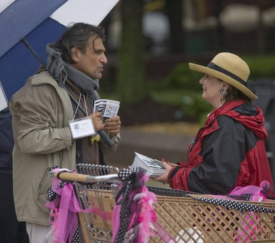 This 2011 file photo shows Patty Gregory talking to Israeli artist Yoram Gal at Art on the Square. She served as the show’s executive director for 20 years before being elected Belleville mayor in 2021.