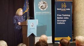 Indiana Commissioner for Higher Education Teresa Lubbers speaks at an annual event in the statehouse.