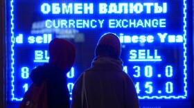 A screen displays exchange rate at a currency exchange office in St. Petersburg, Russia. (Dmitri Lovetsky, File/AP Photo)
