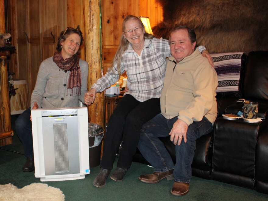 When wildfire smoke choked their community last summer, Amy Cilimburg (left), the director of Climate Smart Missoula, helped Joy and Don Dunagan, of Seeley Lake, Mont., get a HEPA air filter through a partnership with the Missoula City-County Health Department.