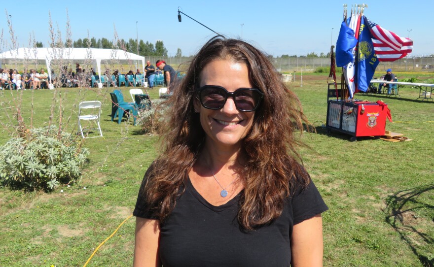 Smiling woman in field. 