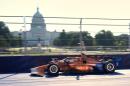 Race car driver Scott Dixon drives his car early for practice near the U.S. Capitol before the IndyCar Freedom 250 Grand Prix auto race in Washington, Sunday, Aug. 23, 2026. (Alex Brandon/AP)