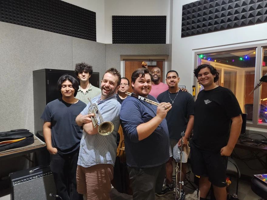 Benny Benack III, FGCU Director of Jazz Studies Brandon Robertson and musicians with the FGCU Jazz Combo performed live in the WGCU Performance Studio. (combo members include Eduard Barcela on piano, Gabe Burgos on bass, Jonathan Eysaman on tenor saxophone, Diego Figueredo on trumpet, Robert Law on drums, and Alejandro Ramirez-Morales on guitar.)