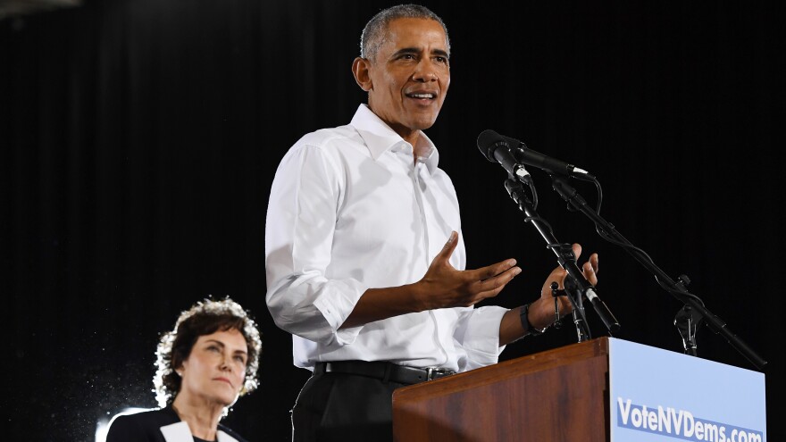 Rep. Jacky Rosen, D-Nevada, looks on as former President Barack Obama speaks during a get-out-the-vote rally as he campaigns for Nevada Democratic candidates on Monday in Las Vegas.