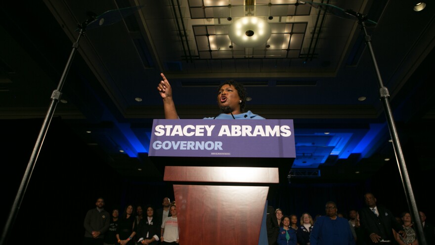 Stacey Abrams addresses her supporters at an election watch party early Wednesday in Atlanta. She and her opponent, Republican Brian Kemp, are locked in a gubernatorial race that remains too close to call.