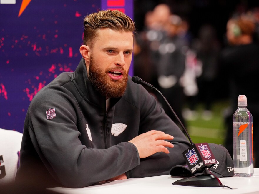 Kansas City Chiefs player Harrison Butker, pictured at a press conference in February, is in hot water for his recent commencement speech at Benedictine College in Kansas.