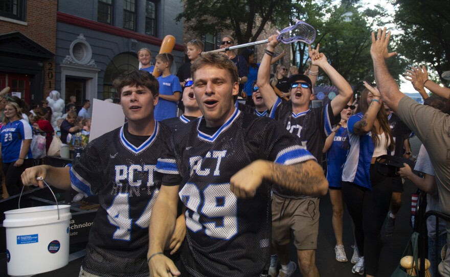 Pennsylvania College of Technology students excitedly march down West Fourth Street during the Little League World Series parade.