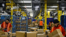 Amazon workers sort packages inside Amazon 's fulfillment in Windsor, May 2, 2023.
