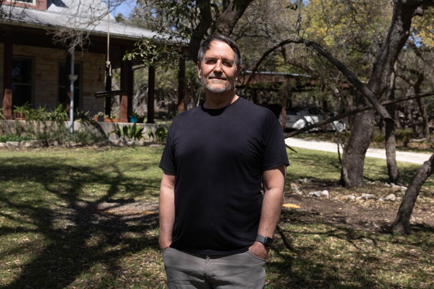 Dale Whistler, Thundercloud Subs artist, poses for a portrait at Wimberly, Texas on Wednesday, March 19, 2025. Patricia Lim/KUT News