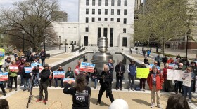  Advocates rally outside Ohio Supreme Court building in Columbus.