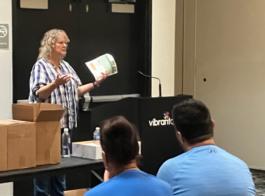 Lori Warren of the Rock Island-based American Job Center explains educational and training dollars available for unemployed workers on Wednesday, Sept. 2.