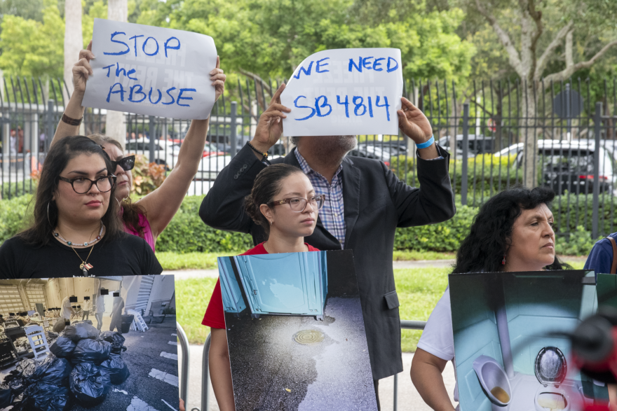 Protestors gather outside an ICE processing facility in Miramar after a whistleblower report alleged overcrowding in the facility. Some advocate for Senate Bill 4814, which would extend Temporary Protected Status for Haitians. Wednesday, Sept. 30, 2026, in Miramar, Fla.